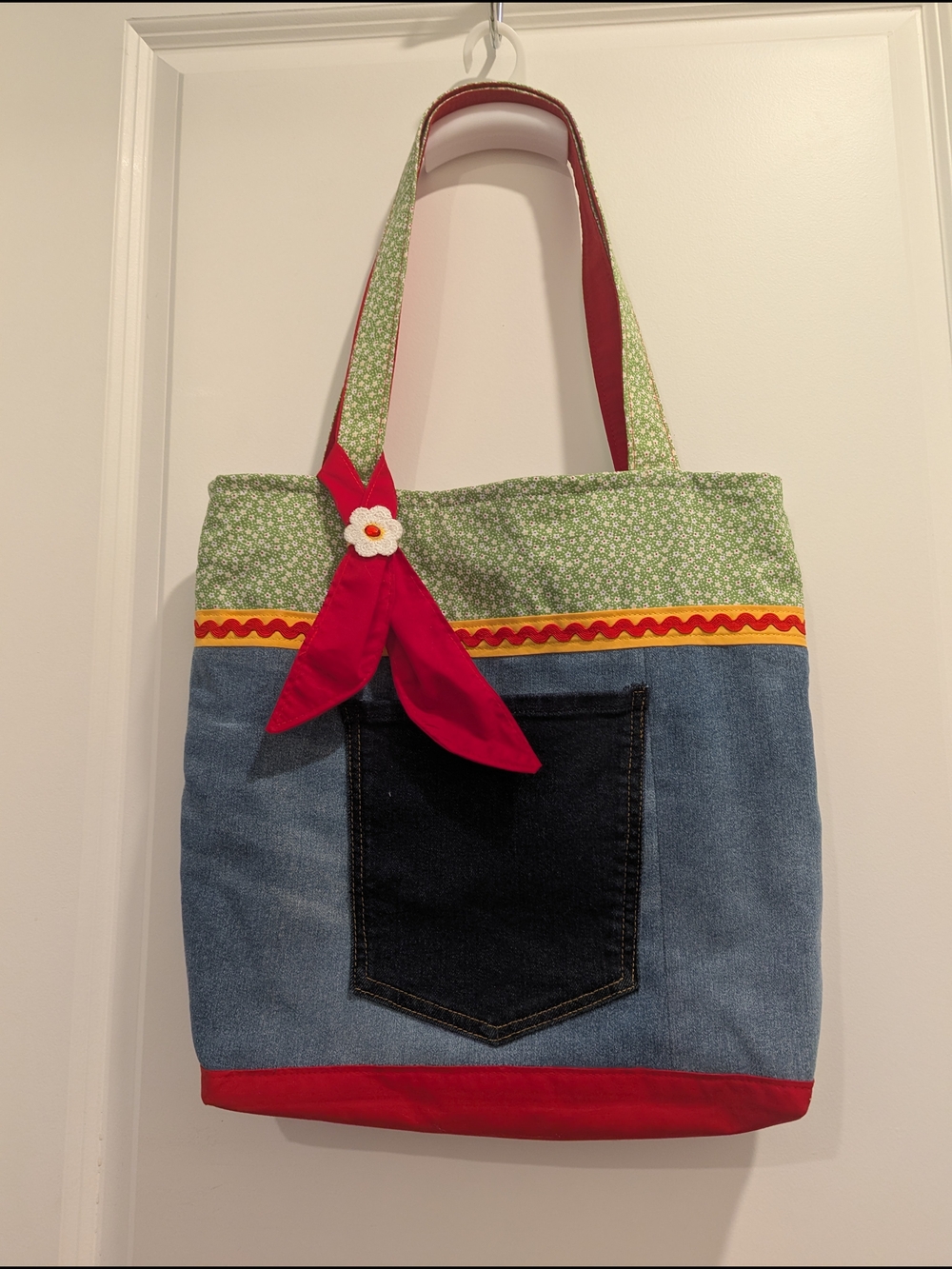 Blue Denim Tote with Green Floral Top and Red Accent